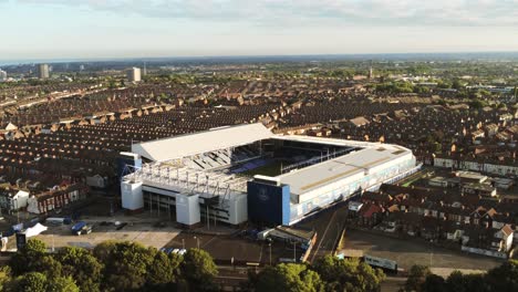 Iconic-Goodison-park-EFC-Liverpool-football-ground-stadium-aerial-view-Everton-slow-rising-push-in-shot