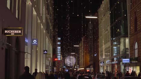 Christmas-lights-and-crowds-down-a-street-in-Hamburg-near-a-Christmas-market-in-Dec-2019