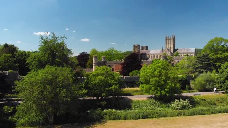 Aerial-view-of-Wells-Cathedral-and-the-moat-in-Bishops-Palace,-Somerset
