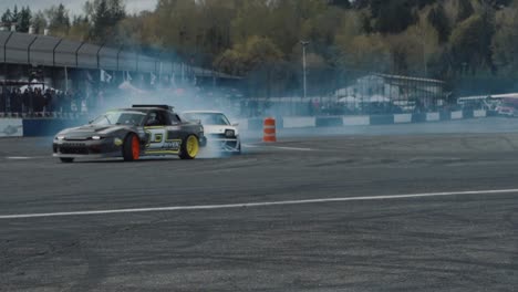 Sports-Cars-Drifting-Competition,-Tires-Smoke-on-Bend-Passing,-Tracking-Shot