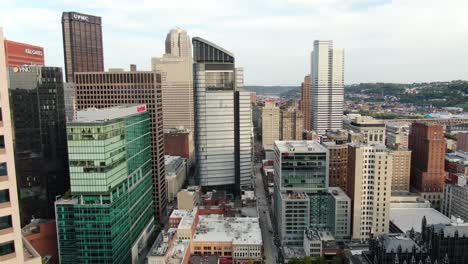 Aerial-turn-reveals-downtown-Pittsburgh,-Pennsylvania-USA-urban-skyscrapers-in-financial-business-district