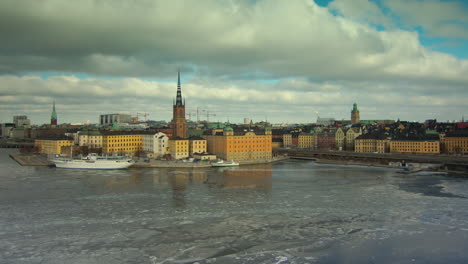 MOTION-TIMELAPSE-ZOOM-OUT-from-the-old-town-Gamla-Stan,-Stockholm