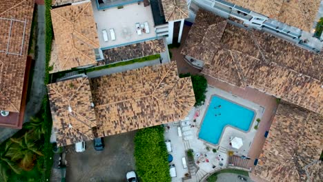 Drone-moving-above-the-swimming-pool-in-Brazil,-Rio-de-Janeiro
