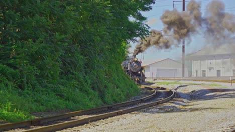 Antique-Steam-Locomotive-and-Passenger-Cars-Starting-Up-with-Steam-and-Smoke