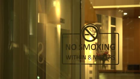 A-no-smoking-sign-within-8-meters-at-the-Zuidas,-the-wall-street-of-Amsterdam,-where-bankers-and-lawyers-hold-office