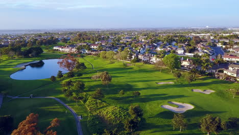 Drone-footage-flying-over-a-Golf-course-in-Huntington-Beach,-Ca