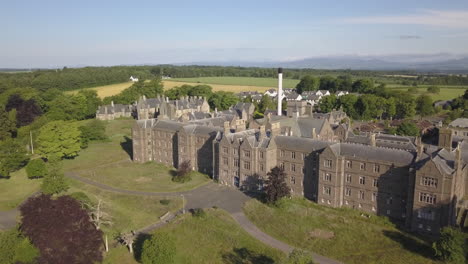 Aerial-view-of-Sunnyside-abandoned-hospital,-Montrose,-Angus,-Scotland