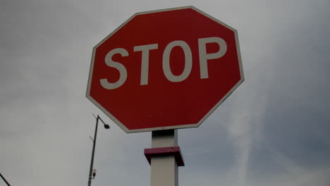 Camera-rotates-around-city-"STOP"-sign