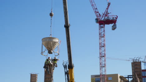 Construction-Site-Workers-Pour-Concrete-Pile
