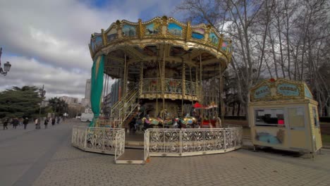 Carrousel,-Mery-go-round-in-Plaza-de-Oriente,-Palacio-Real