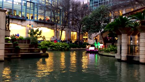 The-Parade-of-Lanterns-casts-a-beautiful-glow-from-the-boats-on-the-San-Antonio-Riverwalk