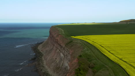 Aerial-Dolly-Shot-of-Yorkshire-Headland-on-Sunny-Spring-Day
