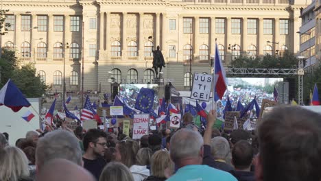 People-holding-and-waving-flags-of-European-union-and-Czech-Republic-during-demonstration-against-premier-Andrej-Babis