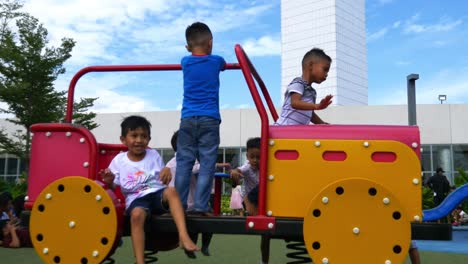 Supervised-by-parents-and-guardians,-frolicking-young-kids-explore-the-playground-attractions-at-SM-Seaside-Mall-on-South-Road-Properties,-Cebu-City,-Philippines