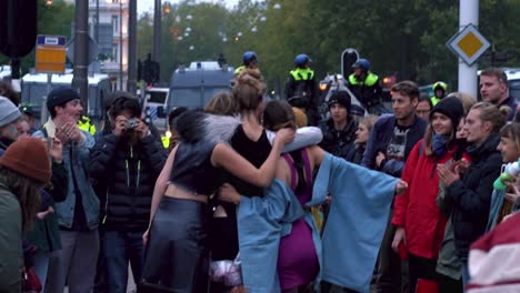 Activists-gathered-and-taking-pictures-during-climate-change-strike-in-Amsterdam,-Netherlands