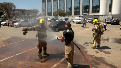 Team-of-firefighters-decontaminate-from-harmful-virus-and-chemicals-after-responding-to-a-COVID-19-hospital-fire