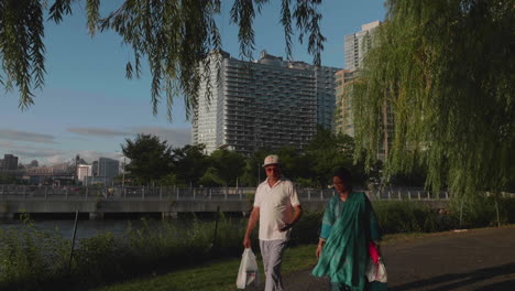 Old-Indian-couple-walking-in-Gantry-Plaza-State-Park