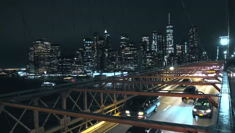 Cars-passing-over-Brooklyn-bridge-in-New-York-City