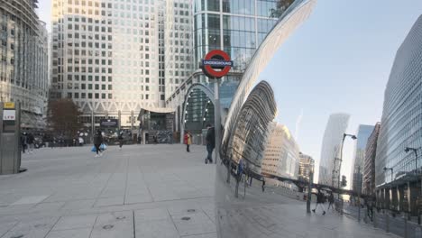 Reflection-off-Canary-Wharf-sculpture-reuters-plaza-underground-station-London