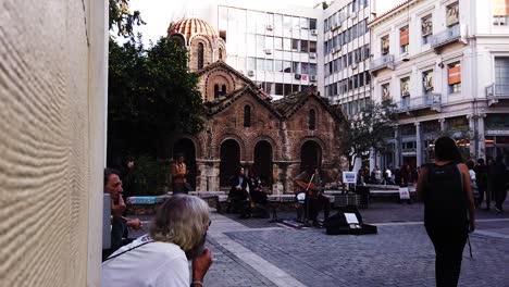 Church-of-the-Assumption-of-the-Virgin-Mary-in-Athens-downtown-while-people-walking-around-during-mid-day