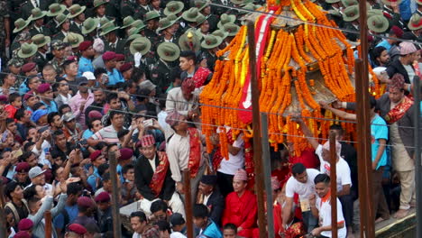 A-crowd-of-people-pull-the-decorated-chariot-of-Kumari-the-Living-Goddess-of-Newar-Community-in-Kathmandu-during-Indra-Jatra-festival-celebration