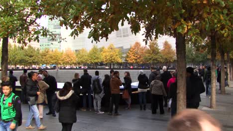 People-visiting-the-National-September-11-Memorial-and-Museum-in-New-York-City,-USA,-in-October