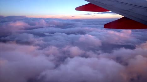 Flying-in-airplane-above-clouds