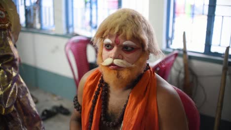 Indian-Actors-and-artists-getting-dressed-up-as-various-roles-or-characters-for-Stage-performance-at-a-drama,-in-a-Fair-and-Festival-in-Kolkata,-India