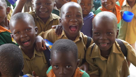 A-Group-of-Children-at-a-School-in-Zimbabwe,-Africa-Laugh-and-Make-Funny-Faces-at-the-Camera