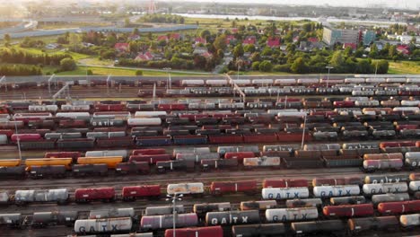 Aerial-shot-Showing-Large-Train-Depot-With-Many-colorful-cargo-Trains