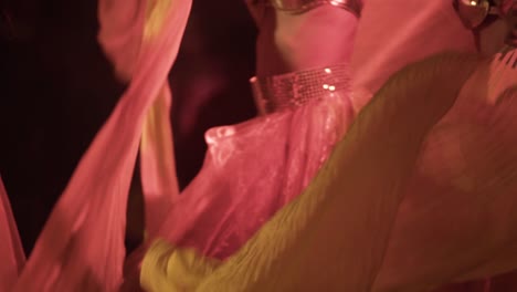 girls-dancers-dancing-joyfully-with-yellow-skirts-at-Cuba,-exotic-dancers-close-up