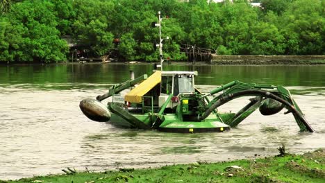 Dredgers-perform-cleaning-and-maintenance-work-on-the-Iloilo-River,-Western-Visayas,-Philippines