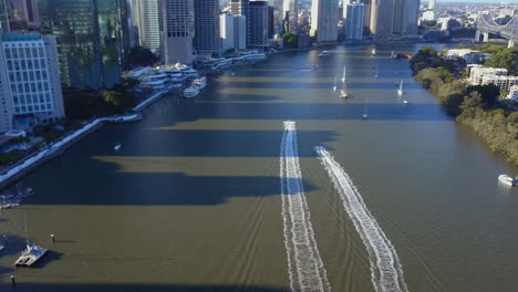 Aerial-shot-of-two-jet-skis-on-Brisbane-River,-Queensland
