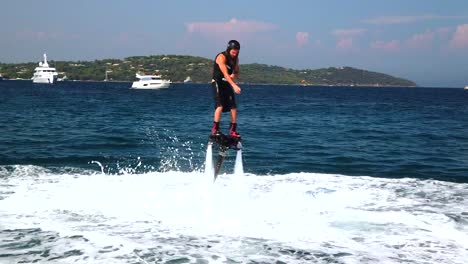 slow-motion-jet-boarding-in-the-south-of-France-with-a-bay-full-of-mega-yachts