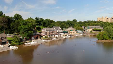 Panning-shot-of-Boathouse-Row-along-Schuylkill-River-and-Fairmount-Park