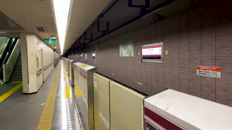 Wide-Angle-Shot-of-empty-Nishi-Shinjuku-Subway-Station-Train-Platform