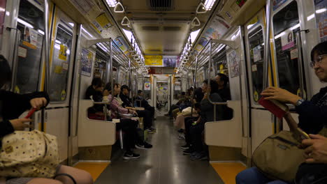 Static-shot-of-japanese-people-commuting-by-subway-in-Tokyo