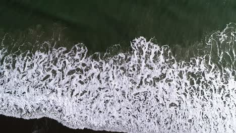 Waves-Lap-Along-the-Shore-of-the-Atlantic-Ocean-as-Sea-Gulls-Fly-Above
