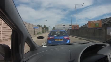 POV-From-Inside-Car-Queuing-To-Get-Into-Waste-Recycling-Centre-In-Harrow,-UK