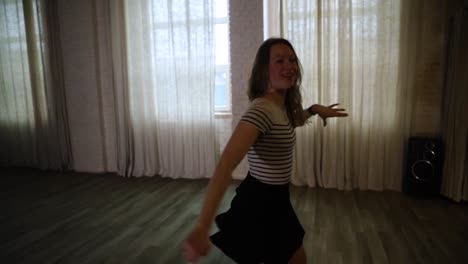 Teenage-girl-dancing-in-the-studio-by-her-own-slow-motion
