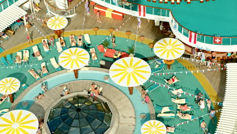 Aerial-Zoom-of-People-Tanning-and-Relaxing-on-a-Cruise-Ship-Liner