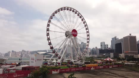 Hong-Kong-Observation-Wheel-and-AIA-Vitality-Park-with-city-skyscrapers-in-the-background