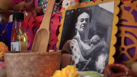 Day-of-the-dead-offering-in-Mexico-with-a-Frida-Kahlo-picture-on-background