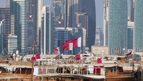 A-collection-of-Qatari-National-Flag-Waving-in-the-air