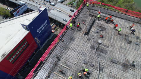 Drone-view-of-Construction-workers-at-Highrise