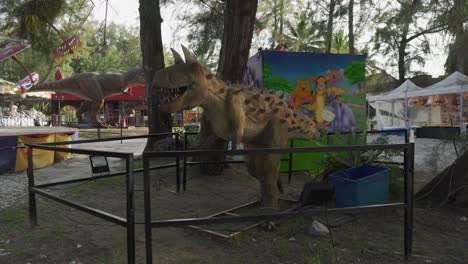 Dinosaur-Statue-at-an-amusement-park-in-Bagan-Lalang,-Malaysia