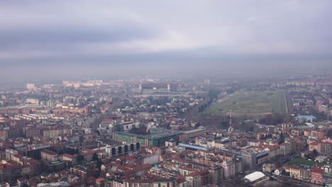 Aerial-view-of-Milan-while-under-heavy-fog-and-weather-changes
