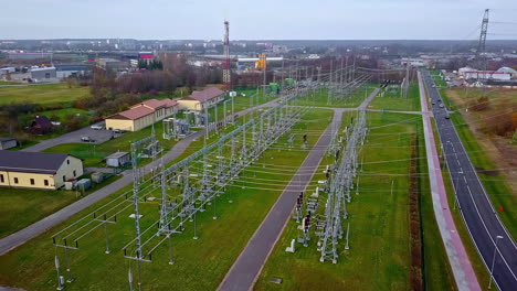 Aerial-View-Of-High-voltage-Electrical-Substation-On-Field
