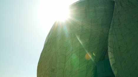 Sun-through-the-marble-structure-of-the-Bahai-Temple-of-South-America,-Santiago-on-a-clear-day