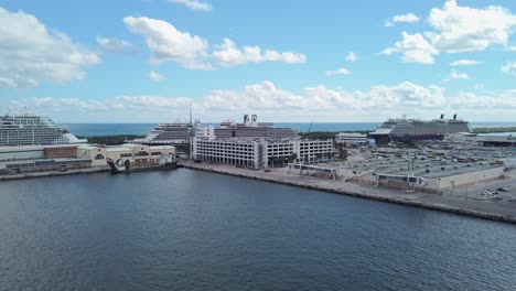 Celebrity-Beyond,-Holland-America-Nieuw-Amsterdam-and-Celebrity-Reflection-during-boarding-process-on-beautiful-Florida-afternoon